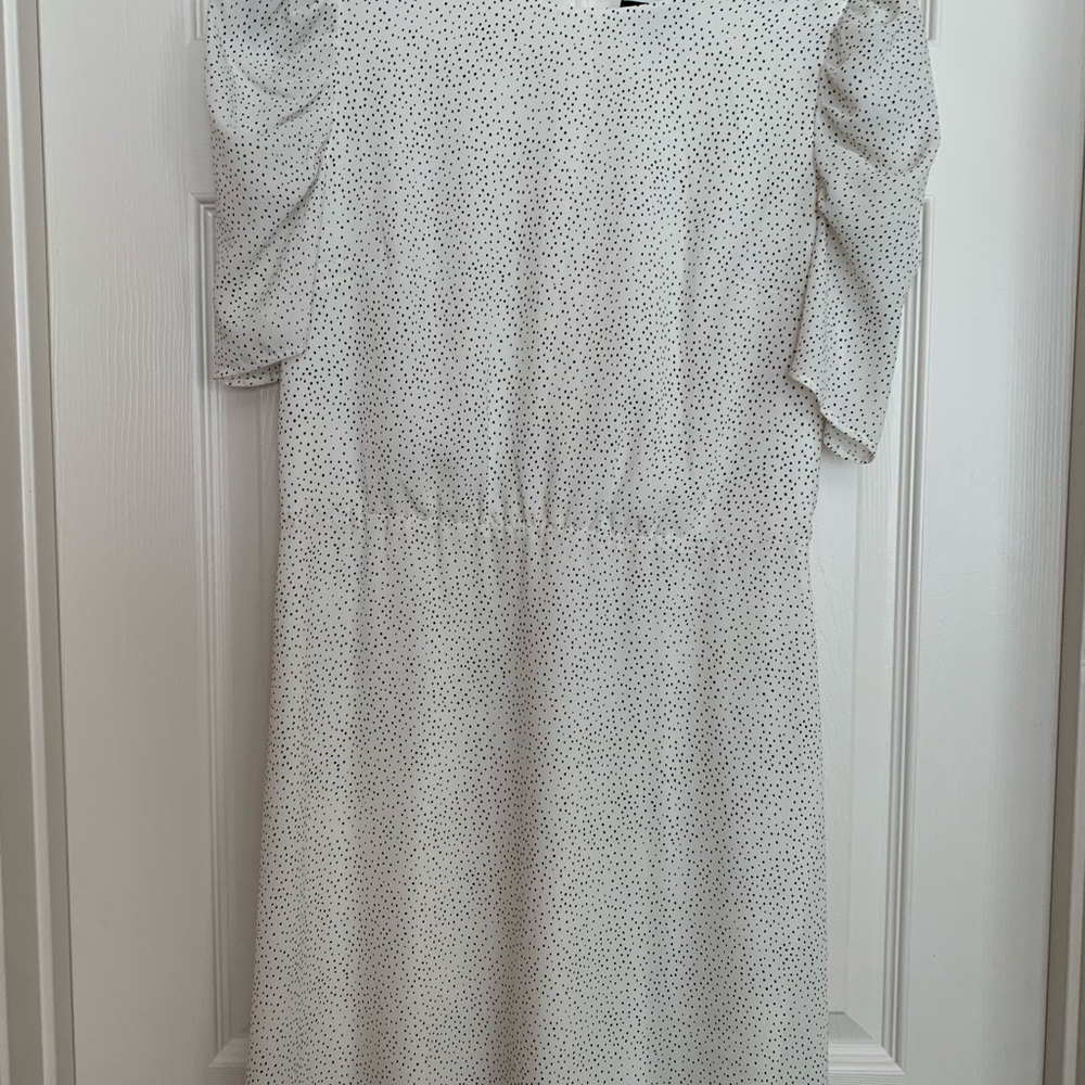 Express dress. White with black like dots. Small. Worn twice to work. Like new!